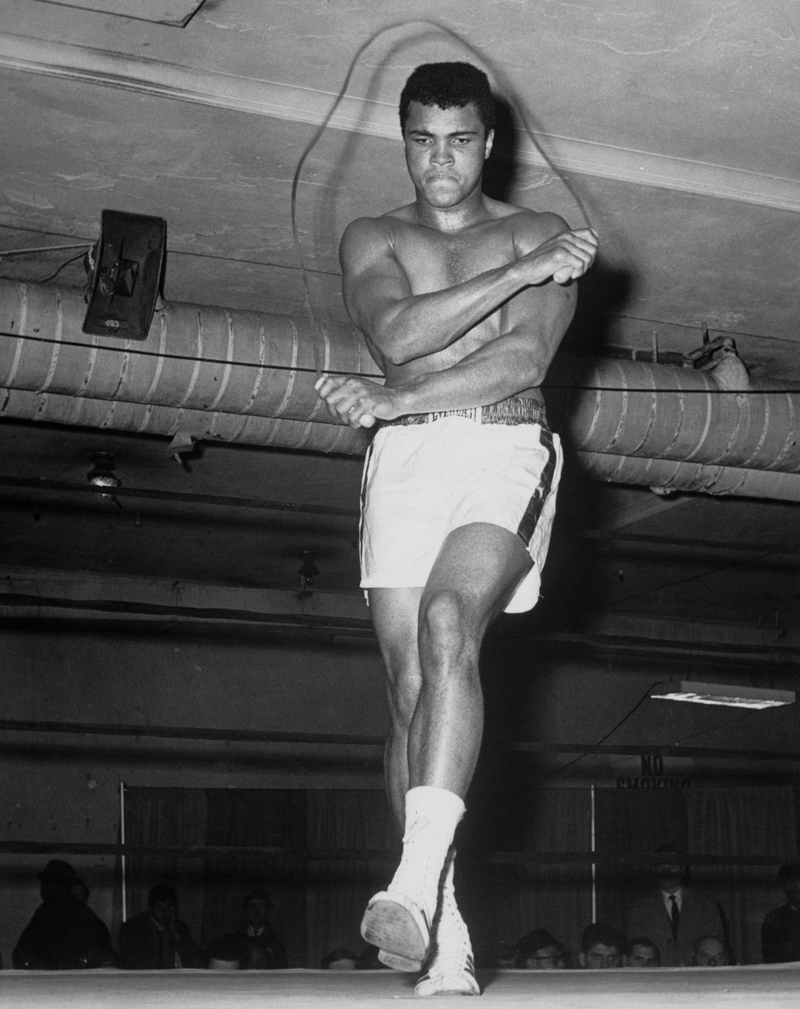 Full length photo of Cassias Clay skipping rope at a gym.Getty Images